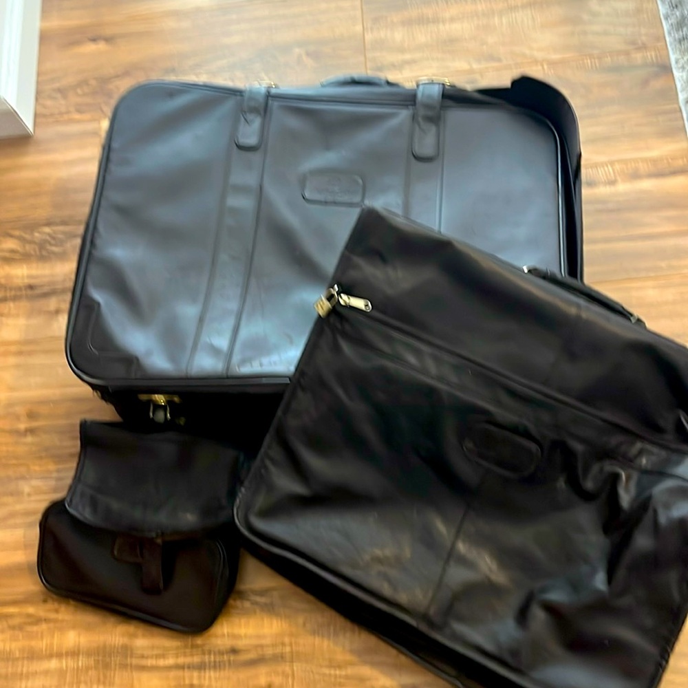 Givenchy travel set. Luxury Givenchy suitcase, garment bag, and toiletry bag.